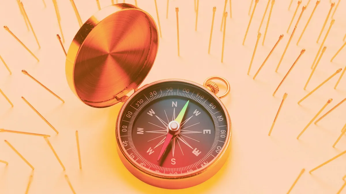 A vintage compass lies open at the centre of the frame, its circular dial fragmented into concentric rings — each ring labelled with a different AI platform nam